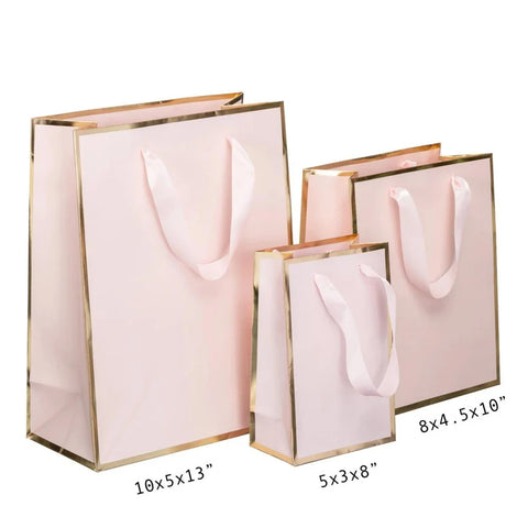 image of a pink bag with gold edges